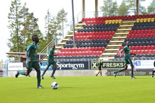 Abdelrazik leads the DU boys down the pitch. Photo: Sean Toshima / i-ACT